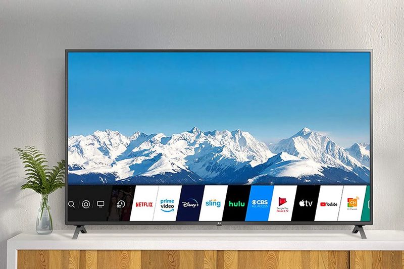 An LG TV on a media stand.