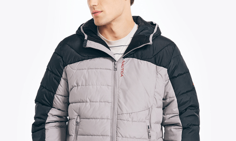 A model wears the Sustainably Crafted Tempasphere Puffer Jacket.
