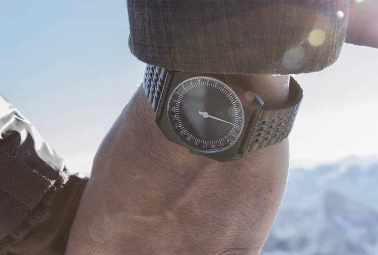 Slow watch on wrist holding hands