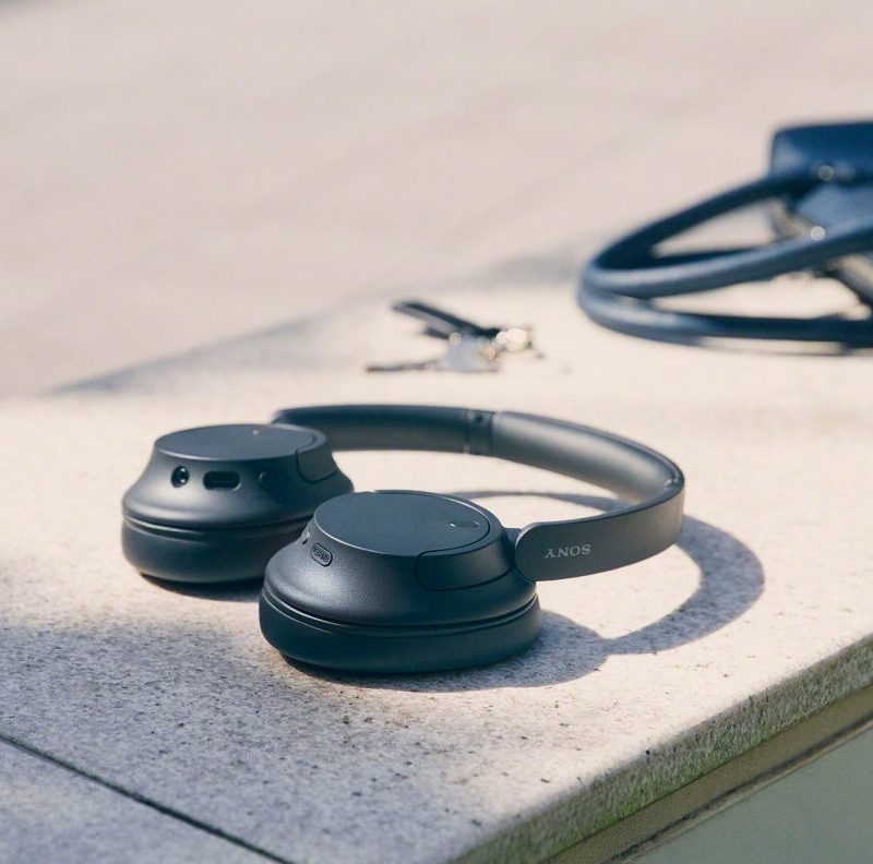 The Sony WHCH720N wireless headphones on a bench.
