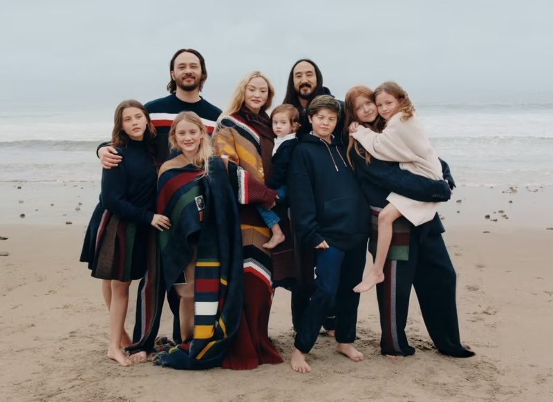 Family poses on the beach