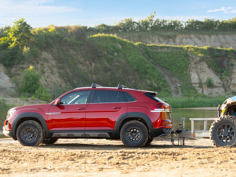 You can toughen up the appearance of a Volkswagen Atlas Sport SUV with the new Basecamp line of styling accessories, shown here about to tow an ATV.