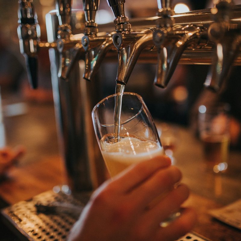 Beer tap pouring beer