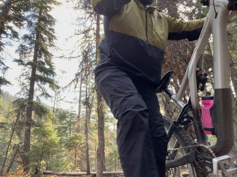 Wearing pants and a jacket while mountain biking