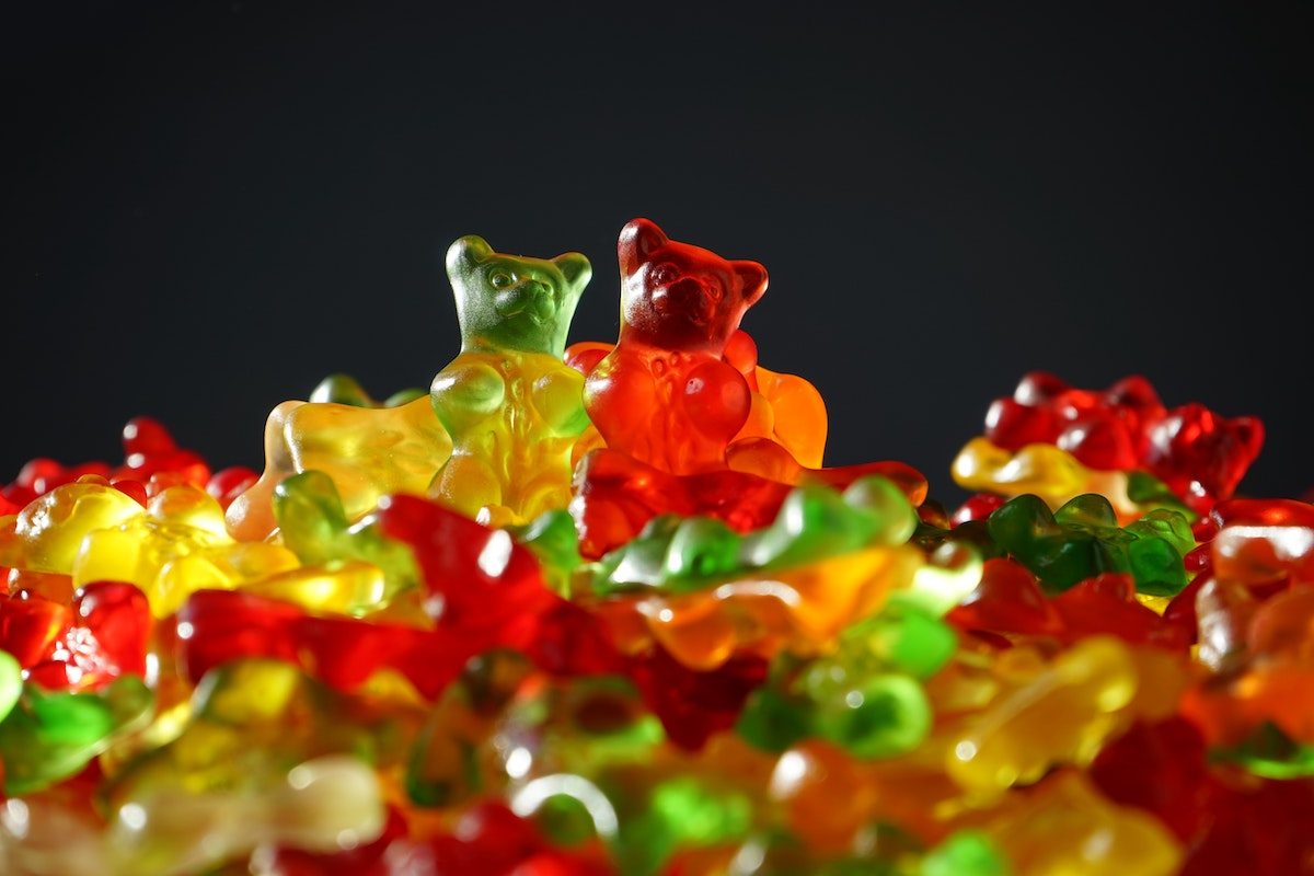 gummy bears against a dark background