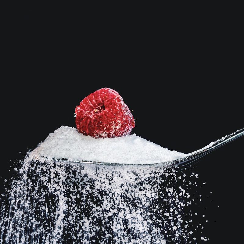 Spoonful of sugar with a berry