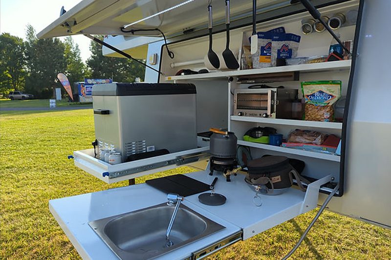 Closeup of the kitchen in Optimized Overlanding's pop-up overlander camper.