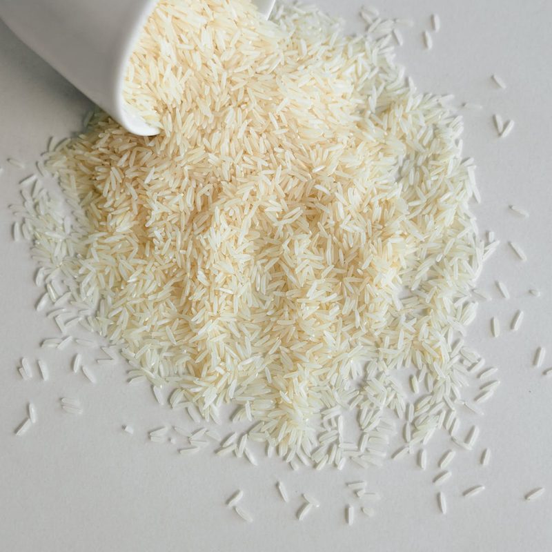 Uncooked rice spilled on a table