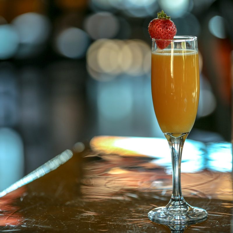 Mimosa with a strawberry