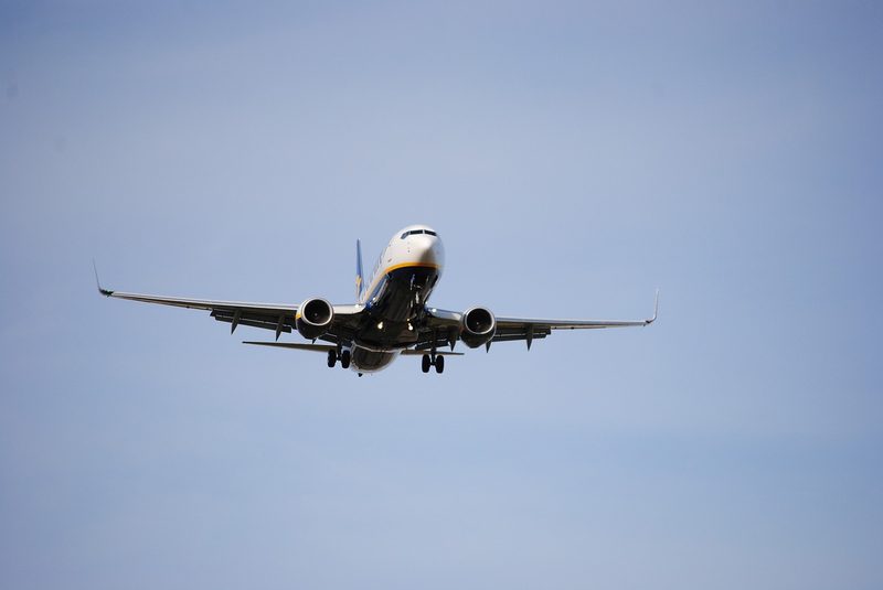 An airplane midflight as seen from below