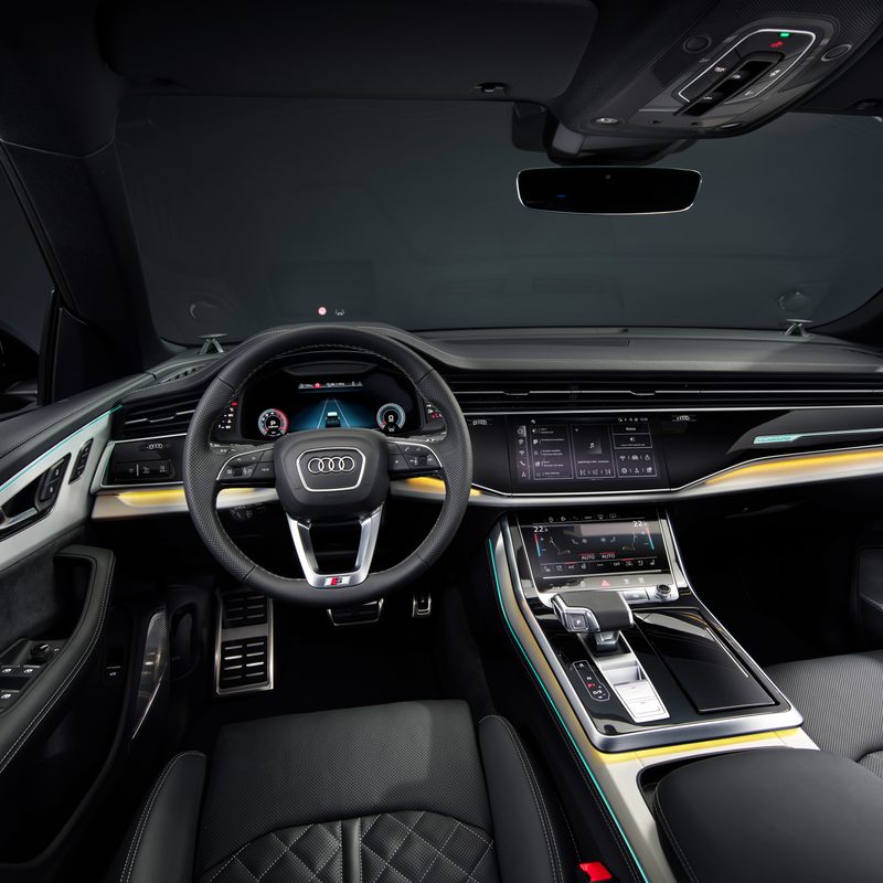 2024 Audi Q8 55TFSI in Sakhir Gold driver cockpit view taken from above drivers headrest - European Model Shown.