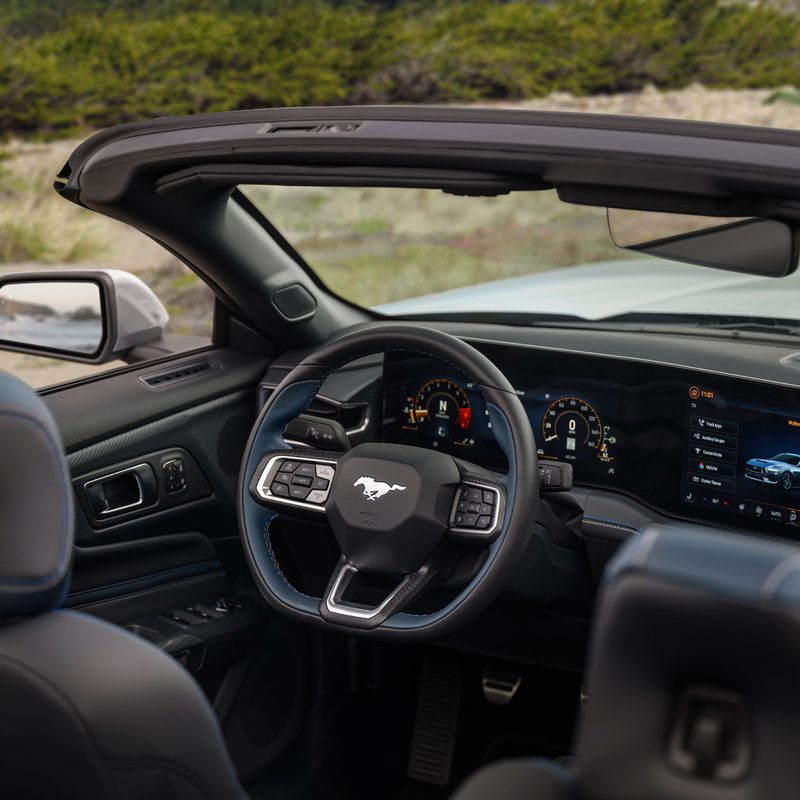 2024 Ford Mustang GT California Special view into the driver's cockpit from elevation behind the right passenger seat.