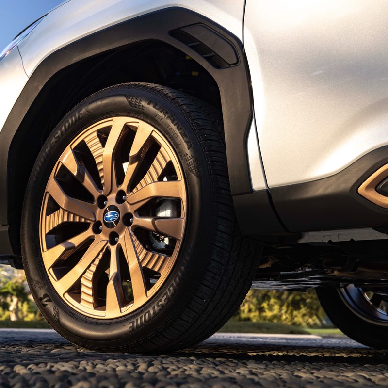 2025 Subaru Forester front left wheel, tire, and wheel well cladding.