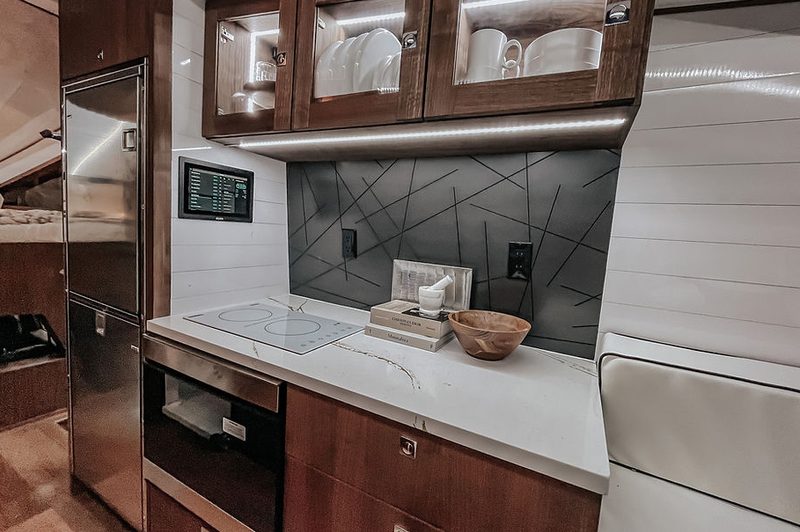 Luxury kitchen inside the 27North F550 Ascender truck camper RV.