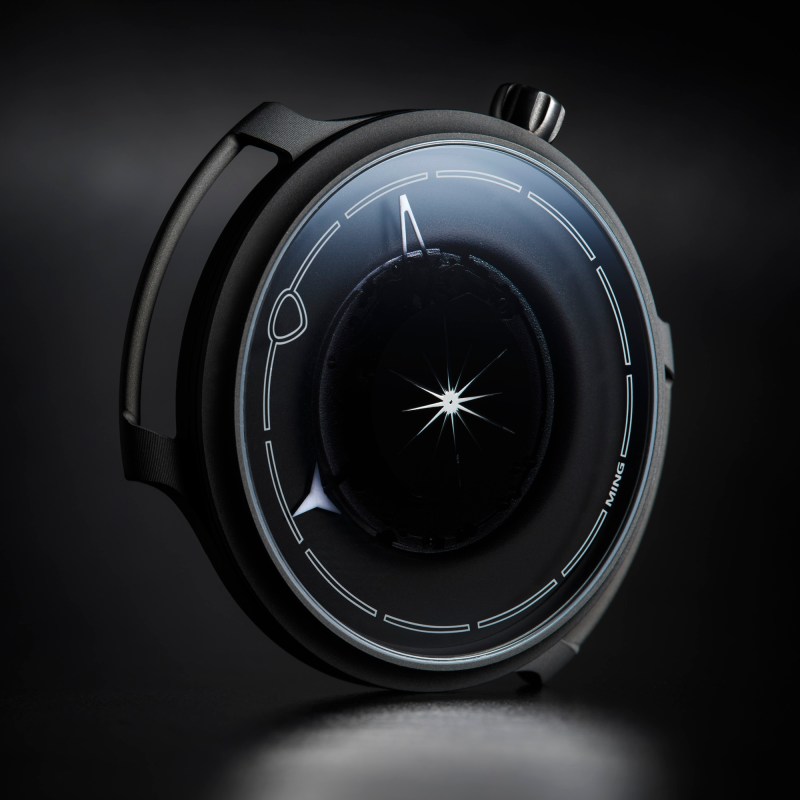 Ming watch dial black background