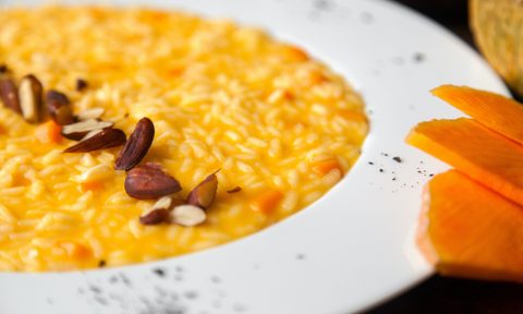 Pumpkin risotto on the plate - a traditional Italian recipe