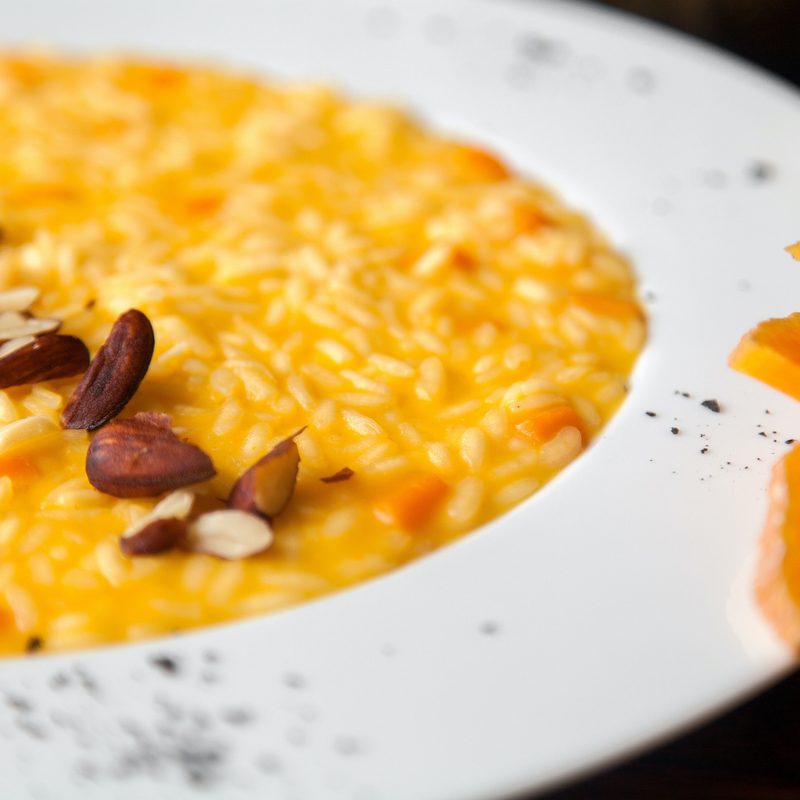 Pumpkin risotto on the plate - a traditional Italian recipe