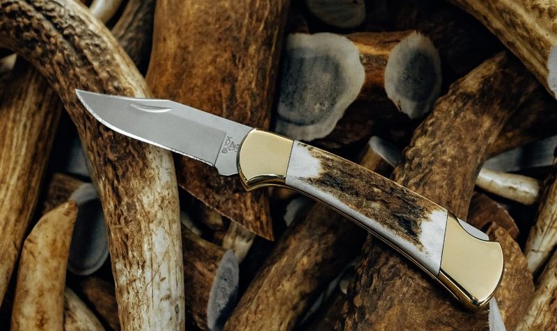 Buck knife in a stack of antlers