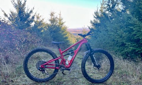 A Revel Rail 29 on a forest road