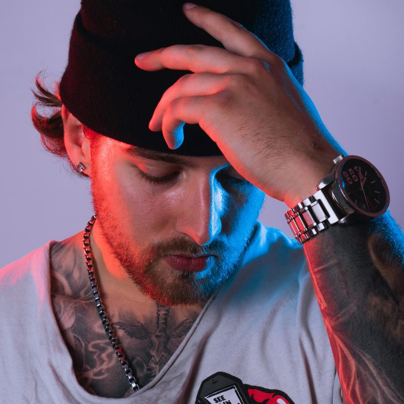 Man in a watch cap and watch