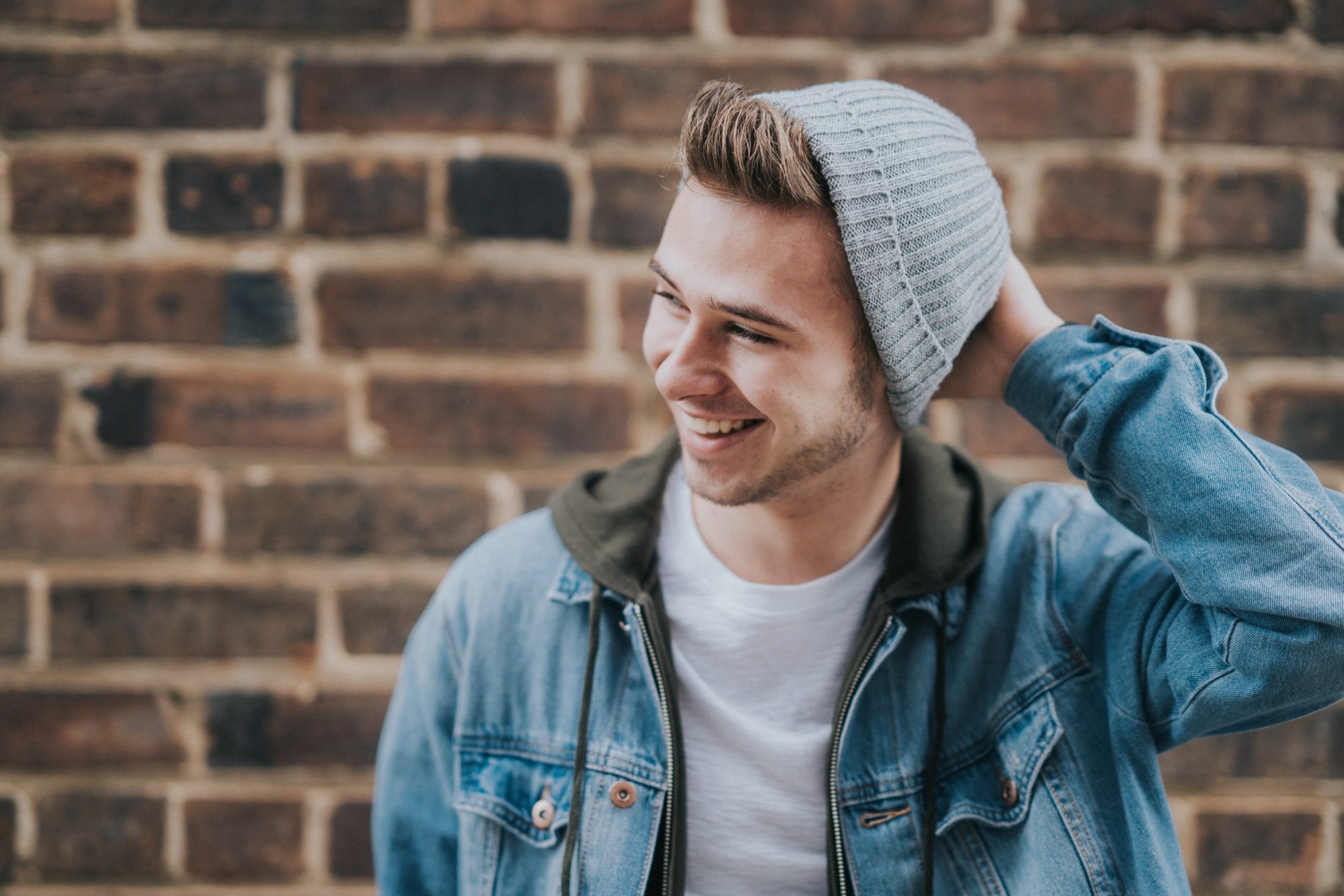 Man in denim jacket and beanie