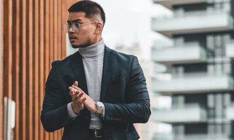 Man in suit and turtleneck