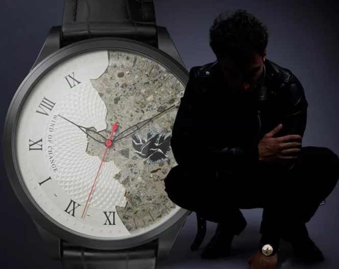 Man kneeling wearing Wind of Change watch