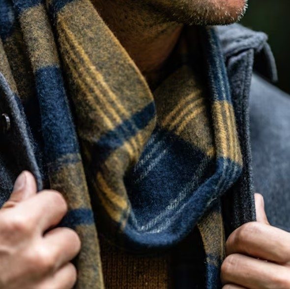 Man wearing Line of Trade Highlands wool scarf