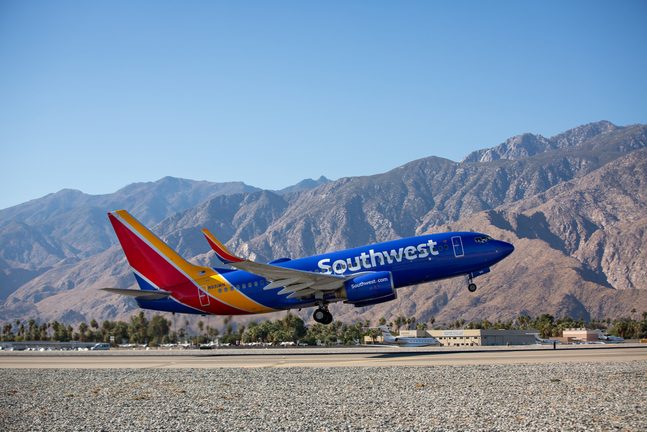 A Southwest Airplane takes off on the tarmac