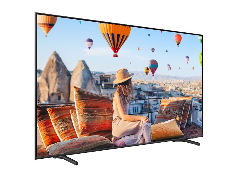The Samsung QE1C QLED 4K TV with a colorful scene on the screen.