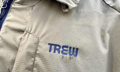 The Trew Gear logo on the front of their Up Jack windbreaker jacket