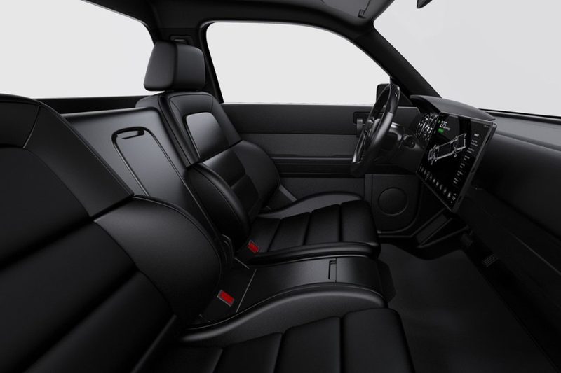 Jet-black interior of the Alpha Motor Corporation Nightwolf Electric Truck.