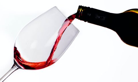 Red wine being poured into glass