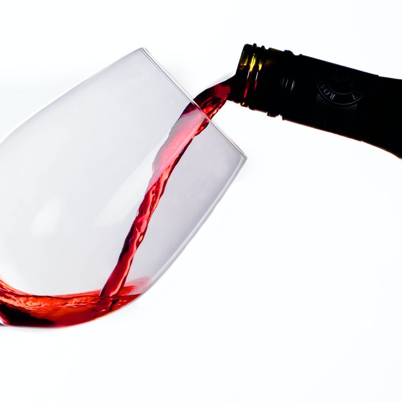 Red wine being poured into glass
