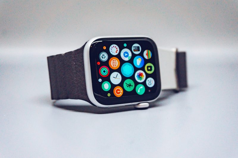 An Apple Watch on its side on a table.