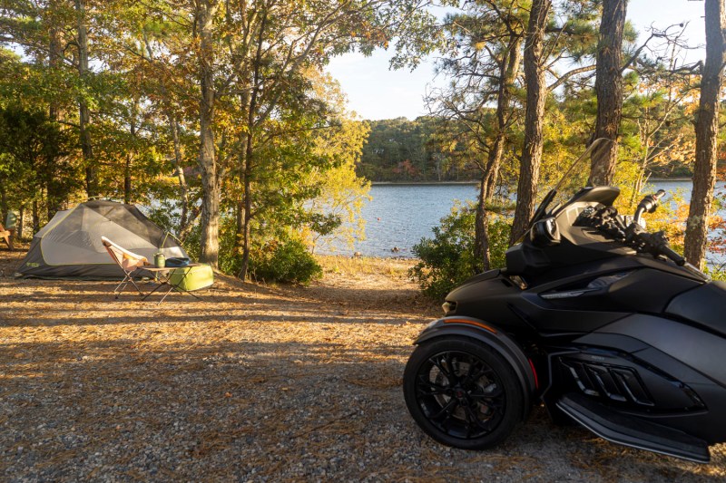 Lakeside campsite setup next to CAN-AM Spyder RT Limited.