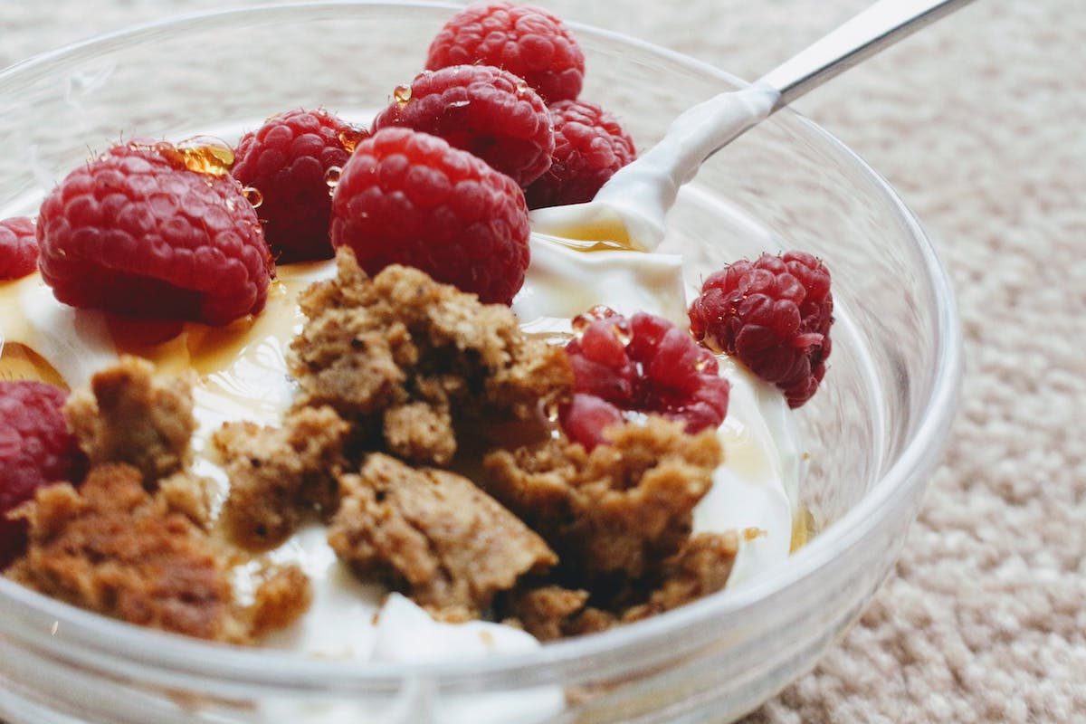 Greek yogurt with granola and raspberry