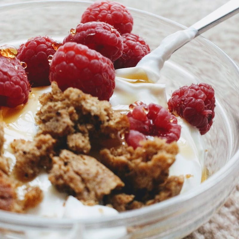 Greek yogurt with granola and raspberry