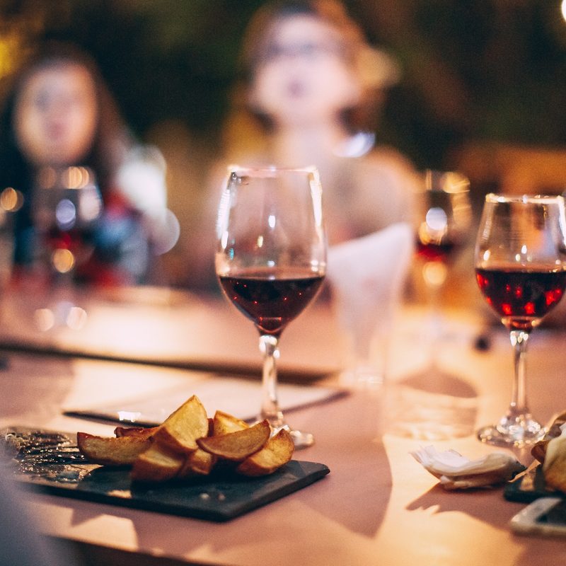Table setting with red wine