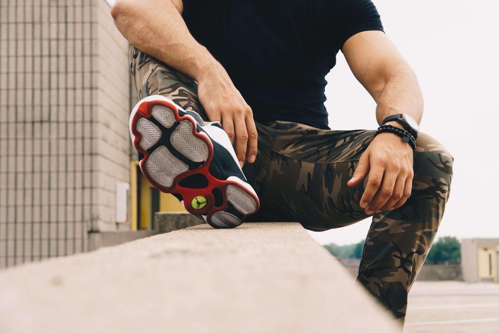 man wearing camo pants
