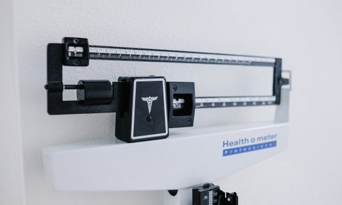 Weight loss scale black and white doctor office weighing scale