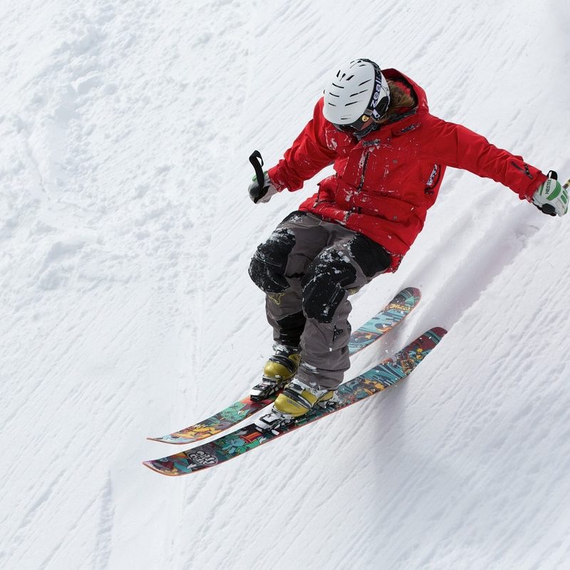 Man skiing downhill