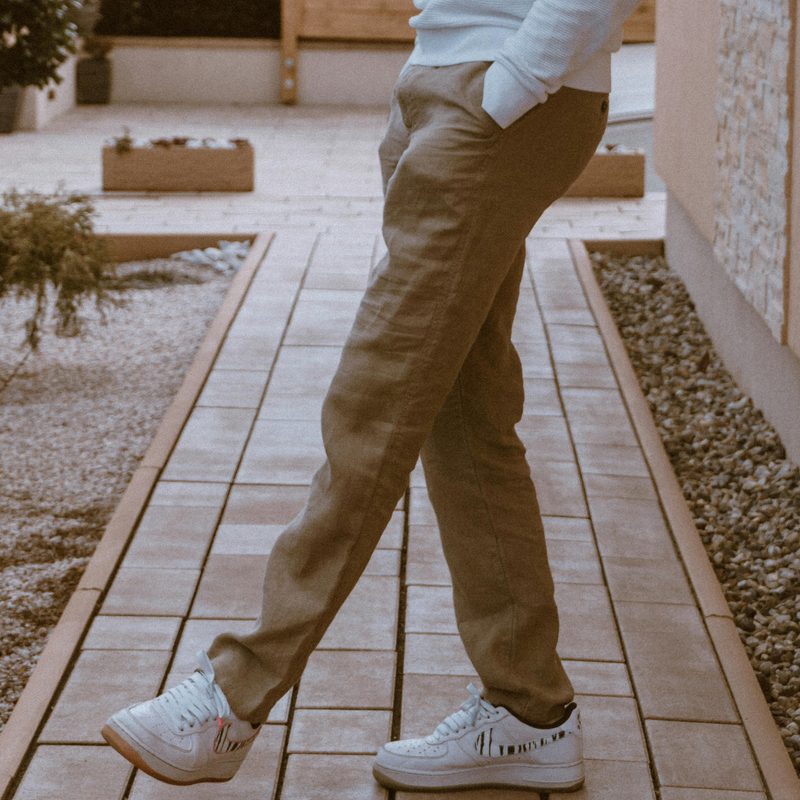 Man in khakis with sneakers
