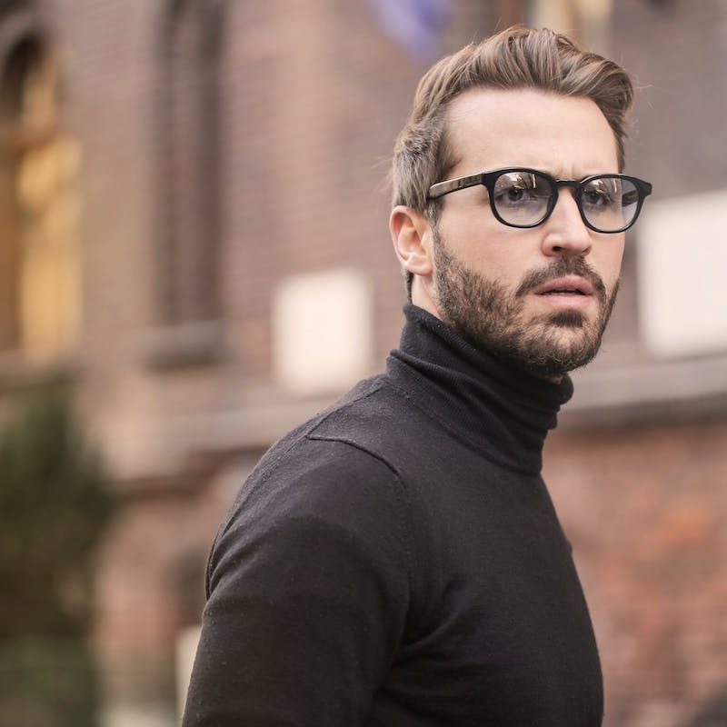 Man in turtleneck outside