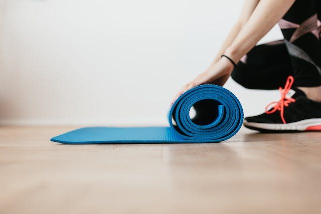 rolling up a pilates mat