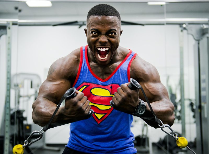 Man lifting weights in gym