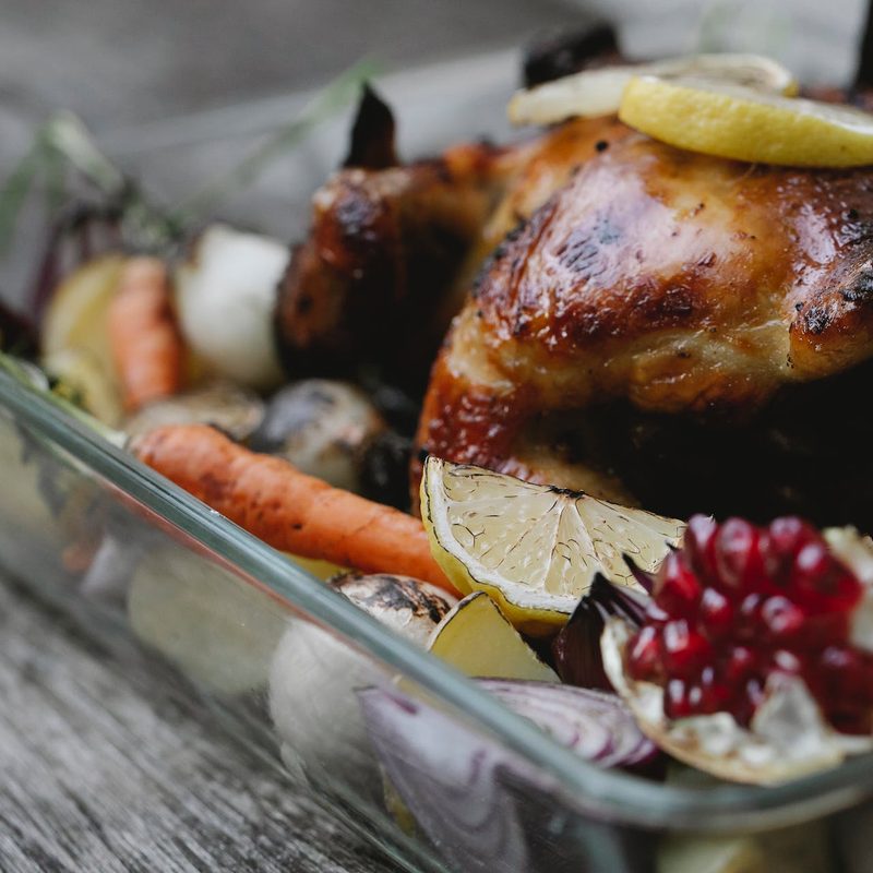Chicken and vegetables in a roasting pan