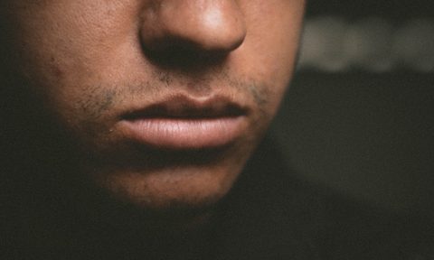 Close-up of man's lips and lower face