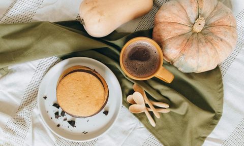 winter squash flat lay with warm beverage