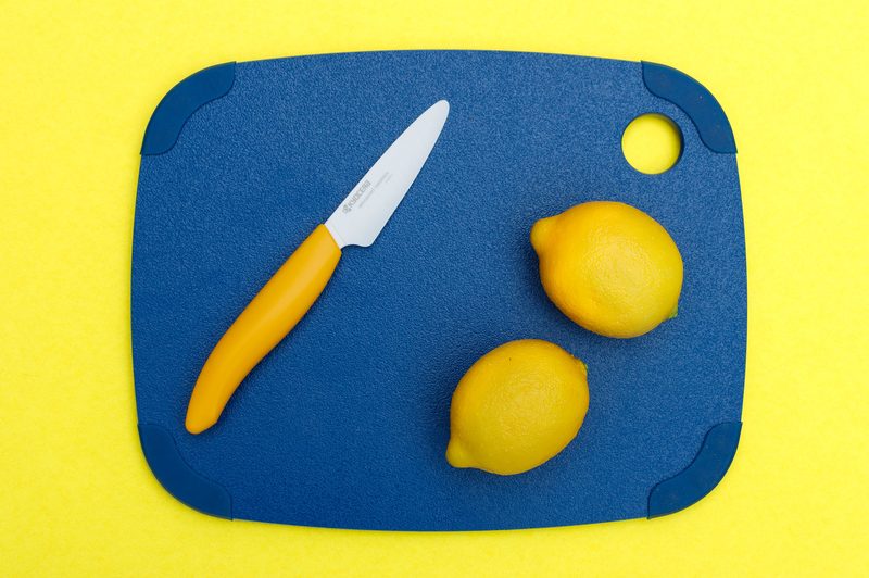 Blue cutting board with lemons